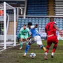 Posh star Siriki Dembele goes down to earn his side a match-winning penalty against Wigan. Photo: Joe Dent/theposh.com.