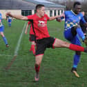 Action from Stilton United (red) v Peterborough North End Sports
