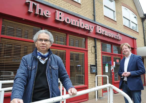 Rony Choudhury owner of the Bombay Brasserie, Broadway, outside his restaurant with Peterborough MP Paul Bristow.