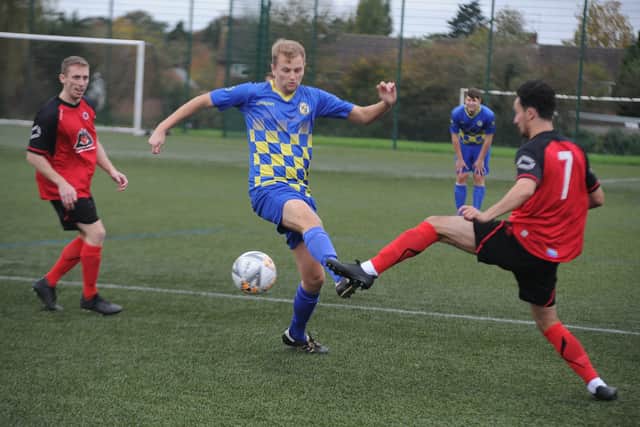 Action from Netherton United (red) v Peterborough Sports North End at the Grange earlier this season.