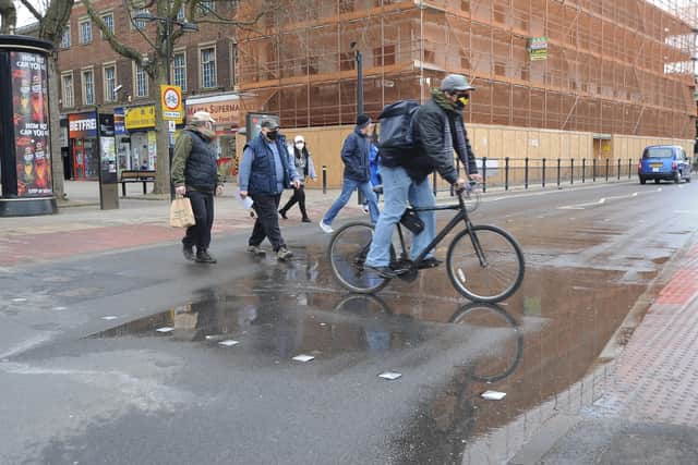 Flooded pedestrian crossing on Bridge Street.