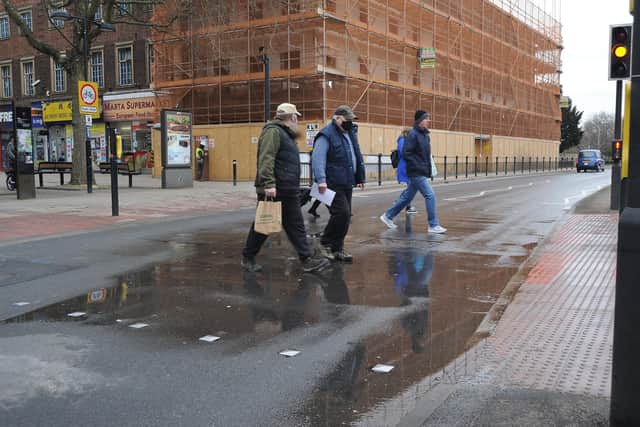 Flooded pedestrian crossing on Bridge Street.