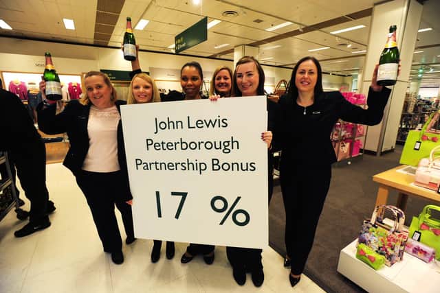 John Lewis staff celebrate their 17% bonus in 2013. ENGEMN00120130703094547