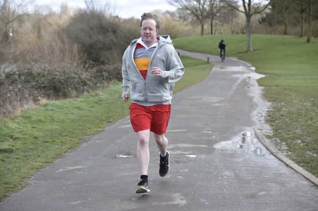 MP for Peterborough Paul Bristow doing ten 10k runs for Sue Ryder Care at Thorpe Hall. EMN-211103-140652009