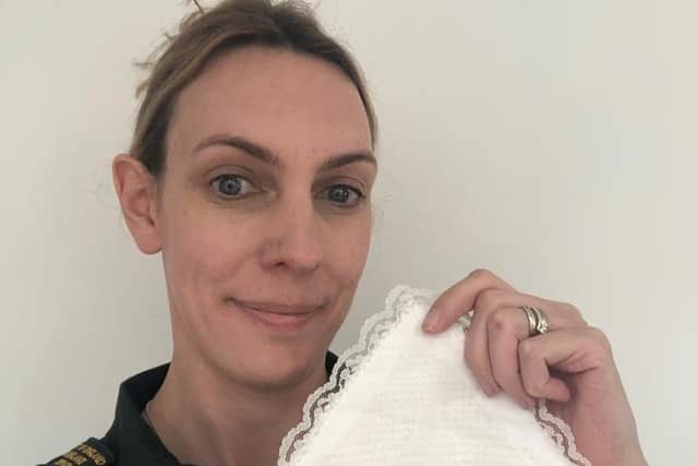 Jenni McClagish, patient safety specialist with EEAST, with a cuddle pocket
