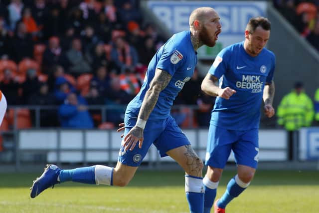 Marcus Maddison in happier times playing for Posh.
