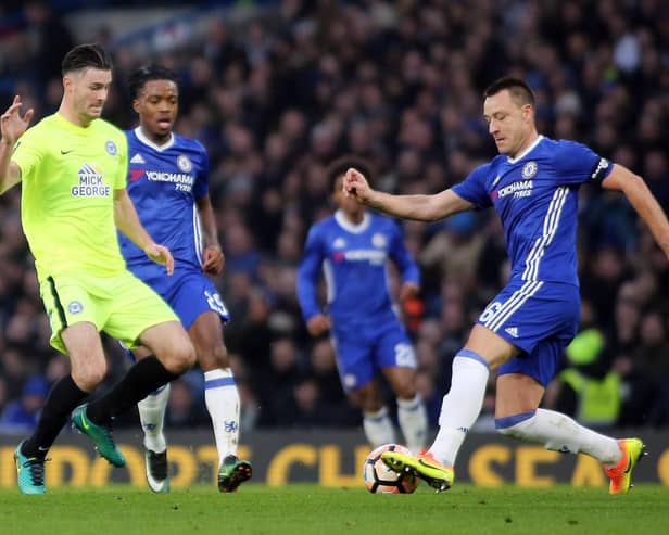 John Terry (right) in action for Chelsea against Posh.