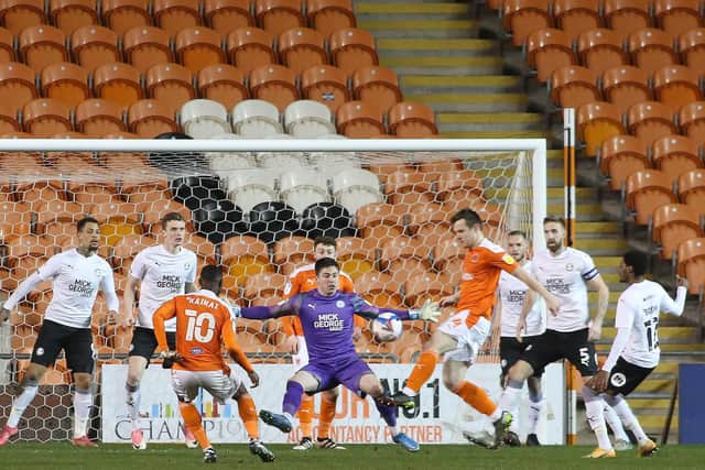 Christy Pym has just dropped a corner and Blackpool are about to win a penalty. Photo: Joe Dent/theposh.com.
