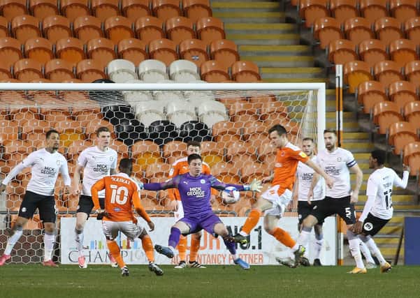 Christy Pym has just dropped a corner and Blackpool are about to win a penalty. Photo: Joe Dent/theposh.com.