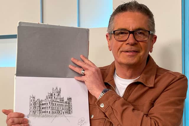 Dave Bradford with his sketch of Highclere Castle.