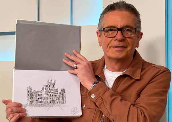 Dave Bradford with his sketch of Highclere Castle.