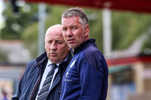 Manager Darren Ferguson and Accrington Stanley manager John Coleman (left) before kick-off on the first day of the season.