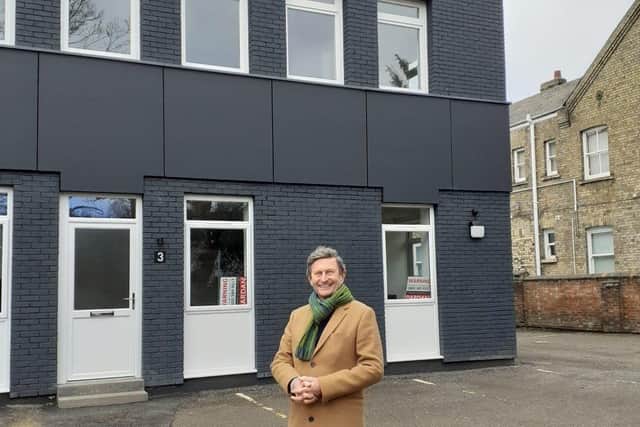 Clle Steve Allen outside the flats