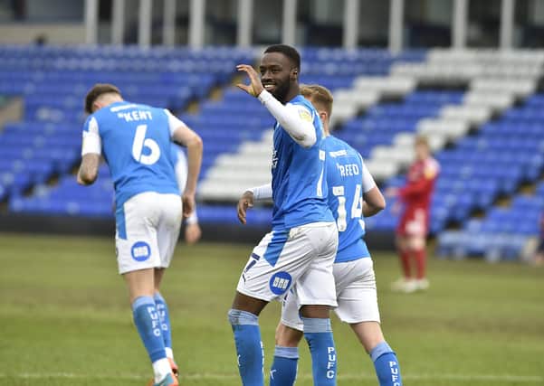 Mo Eisa is all smiles after scoring for Posh against Accrington. Photo: David Lowndes.