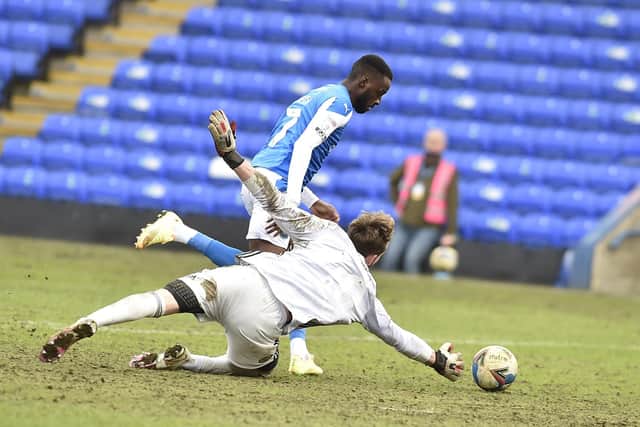 Mo Eisa is on his way to making it 6-0 for Posh against Accrington. Photo: David Lowndes.