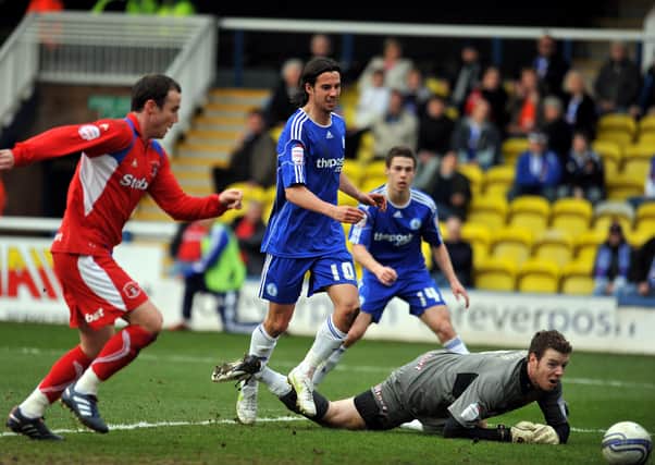 George Boyd opens the scoring in a 6-0 Posh win over Carlisle in 2011.