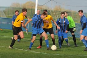 Whittlesey Athletic (blue) in action earlier this season.