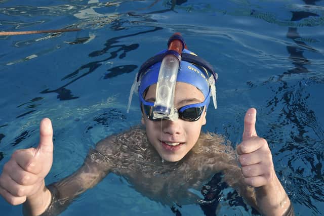 One young COPs member gives the Lido the thumbs up. Photo: David Lowndes.