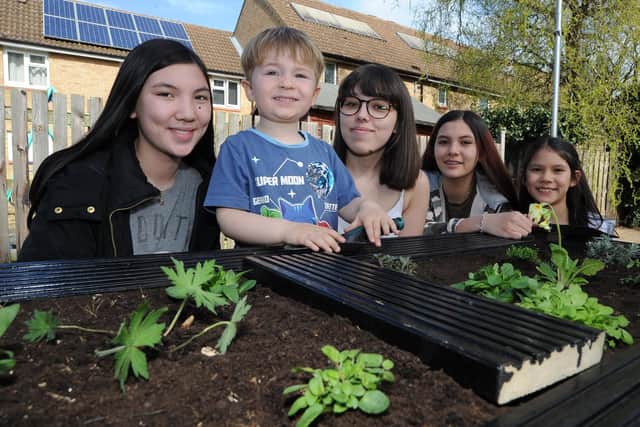 Volunteers from Up The Garden Bath aand residents in Orton Goldhay team up for planting project.