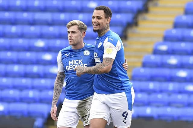 Sammie Szmodics (left) with Jonson Clarke-Harris during the 7-0 Posh win over Accrington Stanley. Photo: David Lowndes.