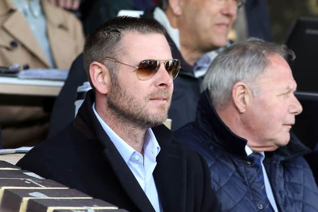 Posh co-owner Darragh MacAnthony (left) with director of football Barry Fry.