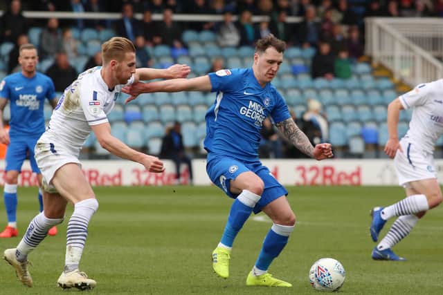 Callum Cooke in action for Posh.