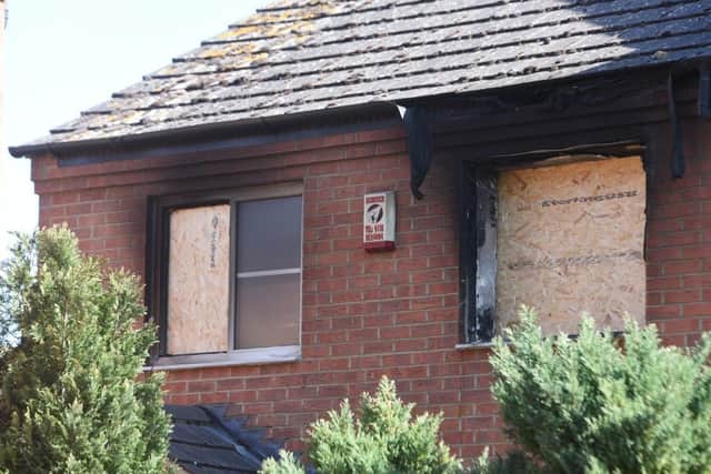 House fire in The Squires, Woodston.