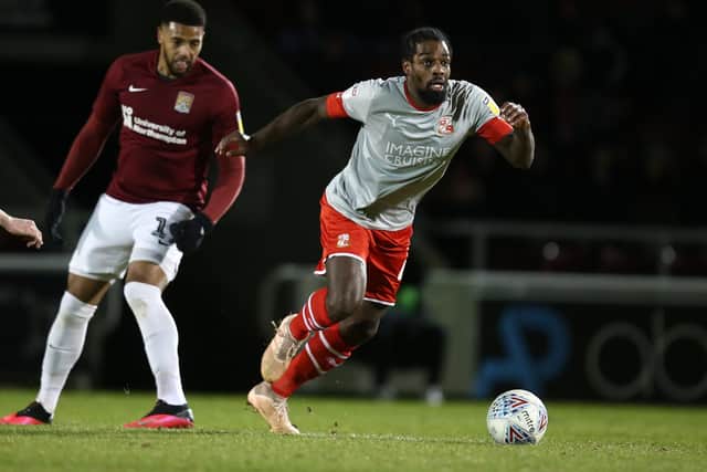 Swindon's former Posh midfielder Anthony Grant.