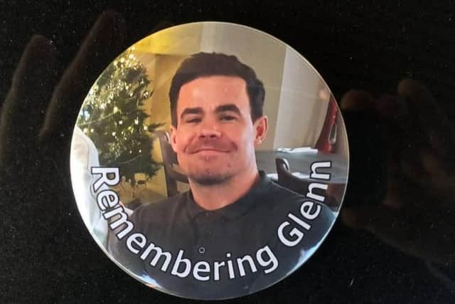 A badge in memory of Glenn Boocock