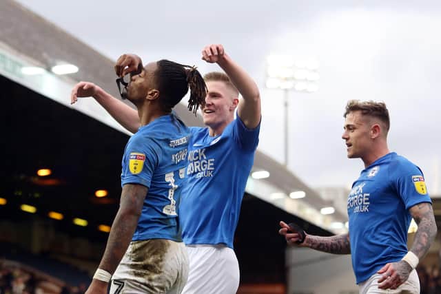 Ivan Toney of Peterborough United celebrates his goal against Portsmouth by paying tribute to Posh groundsman Will Whitney who passed away aged 21 recently. Photo: Joe Dent/theposh.com