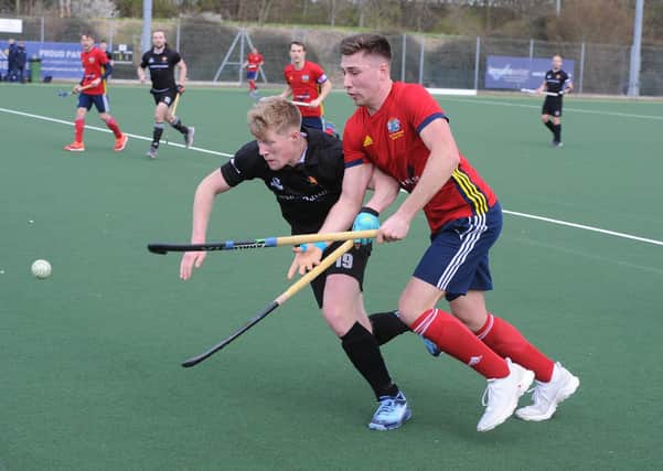 Brendan Andrews (red) in action for City of Peterborough against Cardiff Met. Photo: David Lowndes.