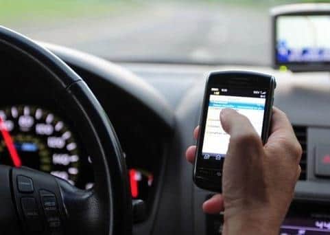 385 drivers were caught using the phone while behind the wheel in Peterborough and Cambridgeshire last year.