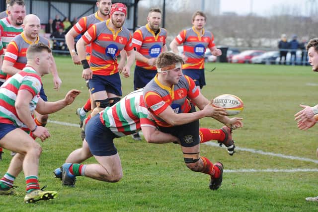 An offload from Borough in their game against Lutterworth. Photo: David Lowndes.