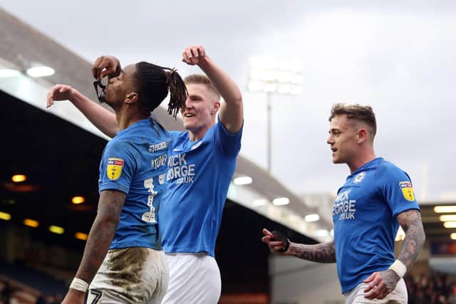 Ivan Toneycelebrates his goal against Portsmouth by paying tribute to groundsman Will Whitney who passed away recently. The players wore black armbands during the game and Toney took his off and held it aloft after scoring.
