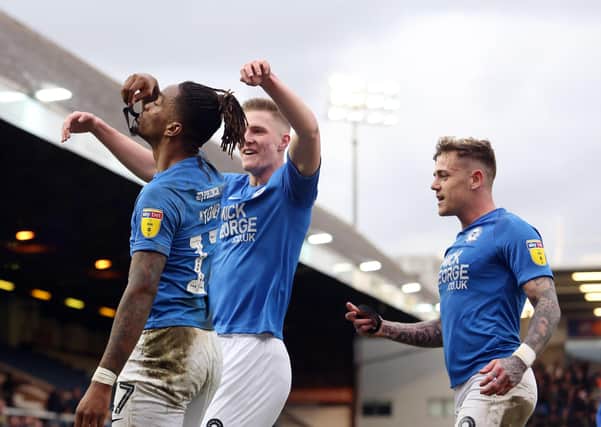 Ivan Toneycelebrates his goal against Portsmouth by paying tribute to groundsman Will Whitney who passed away recently. The players wore black armbands during the game and Toney took his off and held it aloft after scoring.
