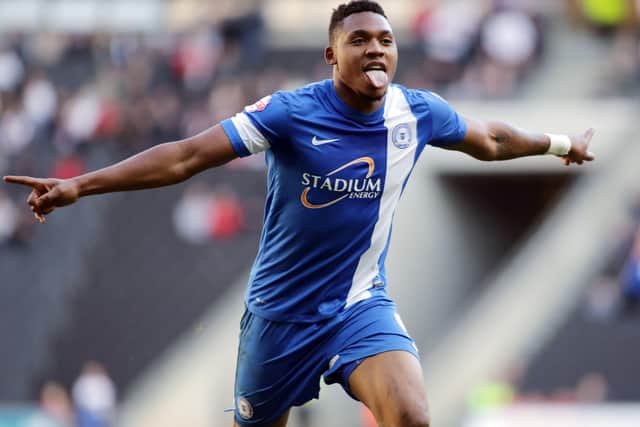 Britt Assombalonga celebrates a Posh goal