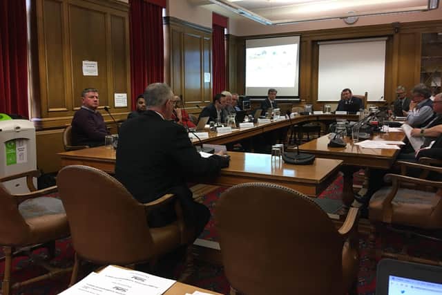 Planning applicant Andy Allen speaks to the city council's planning committee