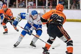 Joe Hazeldine (white) in action for Phantoms in the Cup Final first leg against Telford. Photo: Tom Scott.