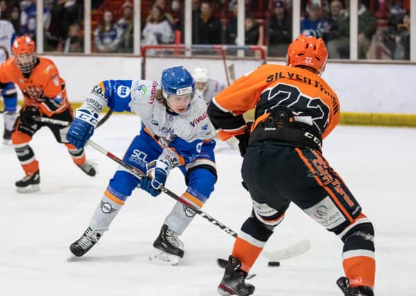 Joe Hazeldine (white) in action for Phantoms in the Cup Final first leg against Telford. Photo: Tom Scott.