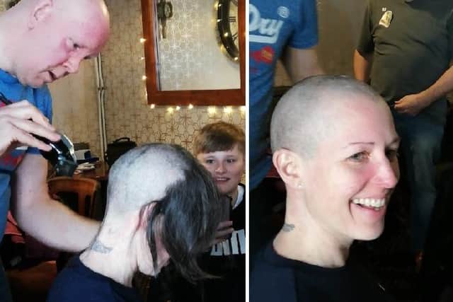 Vicky King having her hair shaved off