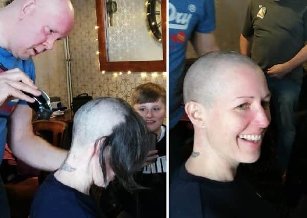 Vicky King having her hair shaved off