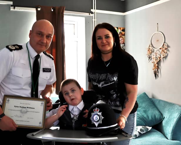 Tyler with hus mum and chief constable Nick Dean