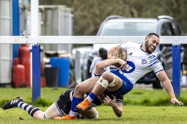 Asher Veamatahau scores for Peterborough Lions against Bedford Athletic. Photo: Mick Sutterby.