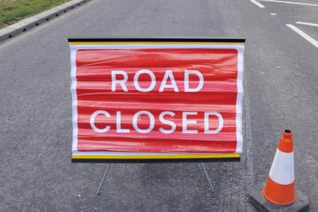 Road closed sign