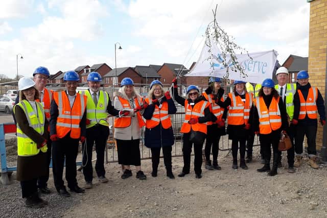 The topping out ceremony at the site of the new Hampton Lakes school