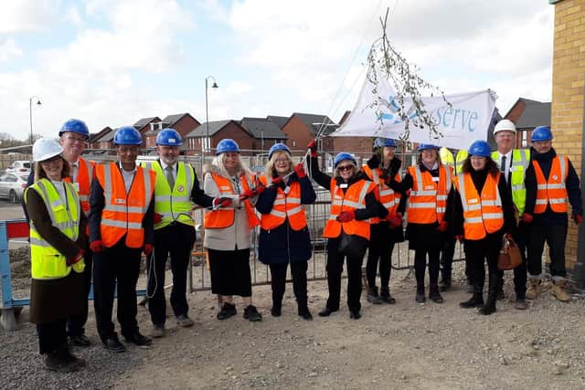 The topping out ceremony at the site of the new Hampton Lakes school