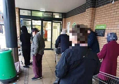 People queuing outside Asda this morning