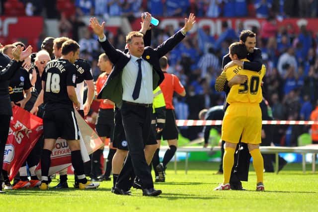 Darren Ferguson and his Posh team celebrate success at Old Trafford.