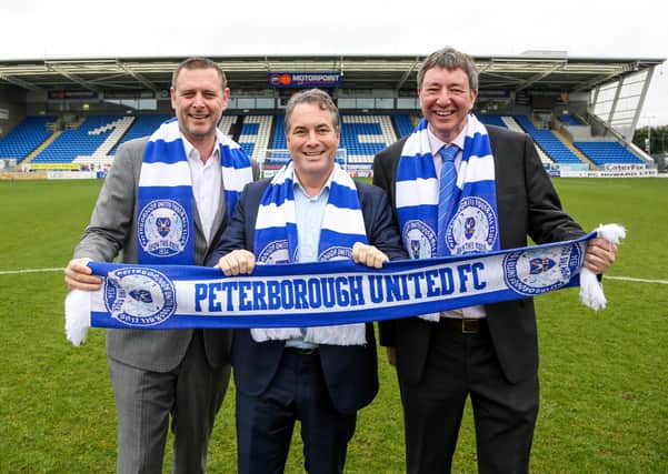 Posh co-owners from left, Darragh MacAnthont, Stewart 'Randy' Thompson and Dr Jason Neale.