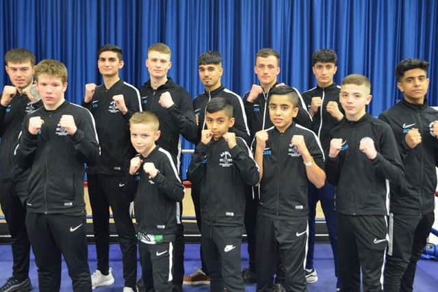 The Peterborough Police Boxing Club fighters who took part in the club's own show, back left to right: Brian Lawless, Jaan’sher Raja, Taylor Frisby, Danish Asif, Ryan Davies, Ali Raja, front:  Connor Dane, Reggie Baker, Aamir Shirazi, Imraan Shirazi, Shae Gowler and Subhan Raja.